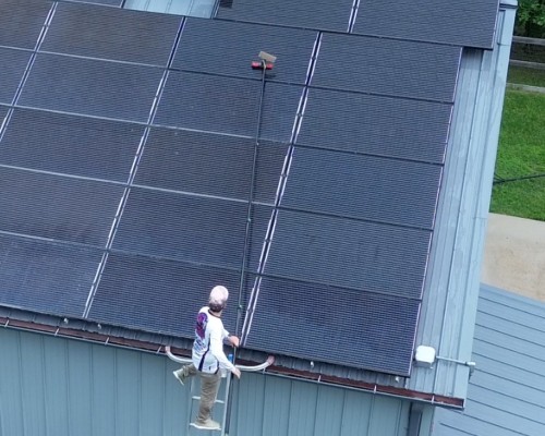 Solar panel cleaning service being completed for Houston, Texas home